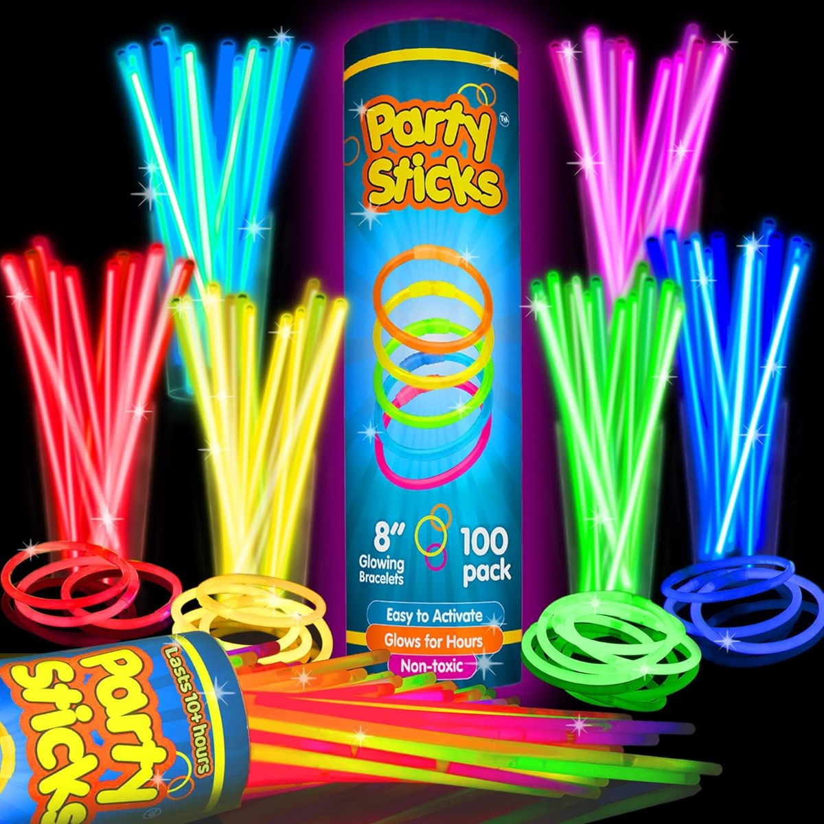 Assorted glow sticks lighting up a dark room
