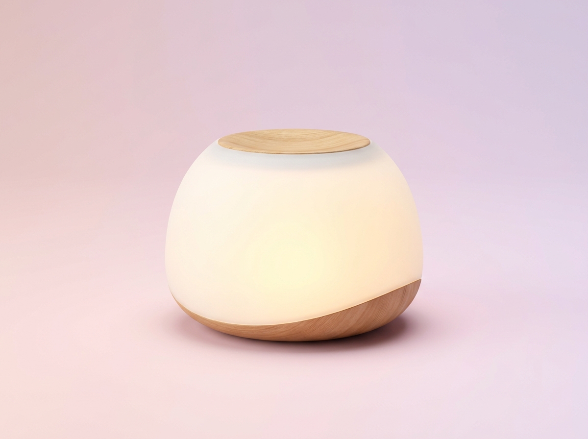 Hatch Rest sound machine and night light on a nursery shelf